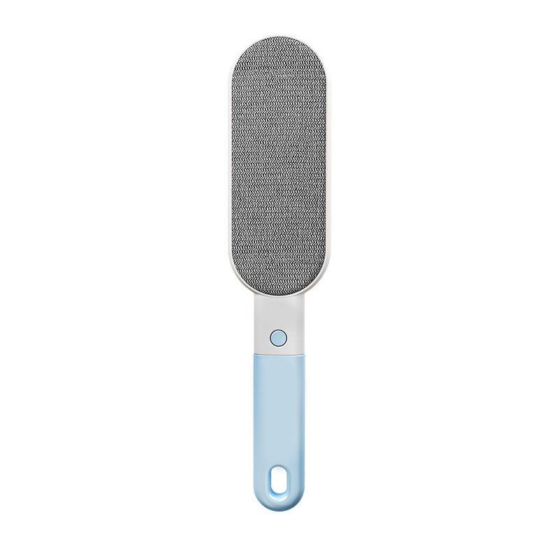 Light blue handheld lint remover with textured roller for pet hair and fabric care