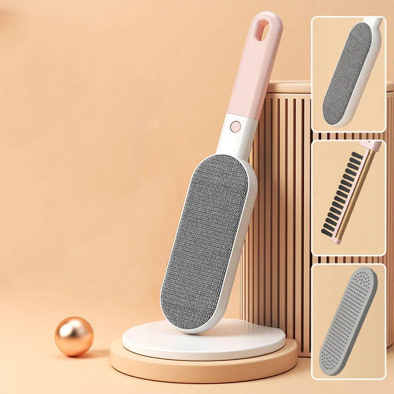 Pink-handled pet hair remover with textured surface, ideal for fur-free living and lint removal on clothes and furniture.